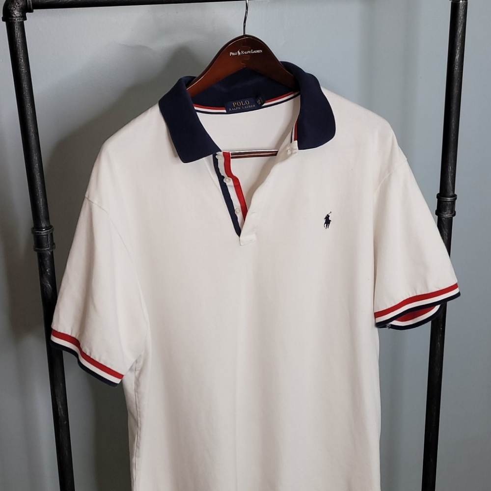 Red and navy trimmed white polo shirt